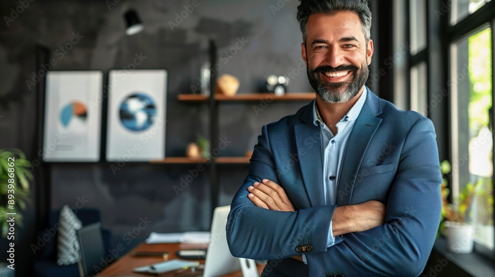 Confident Senior Businessman with Grey Hair Smiling in Office Environment Confident Senior Businessman with Grey Hair Smiling in Office Environment