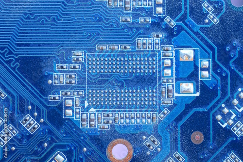 part of a blue microcircuit board with small gray details