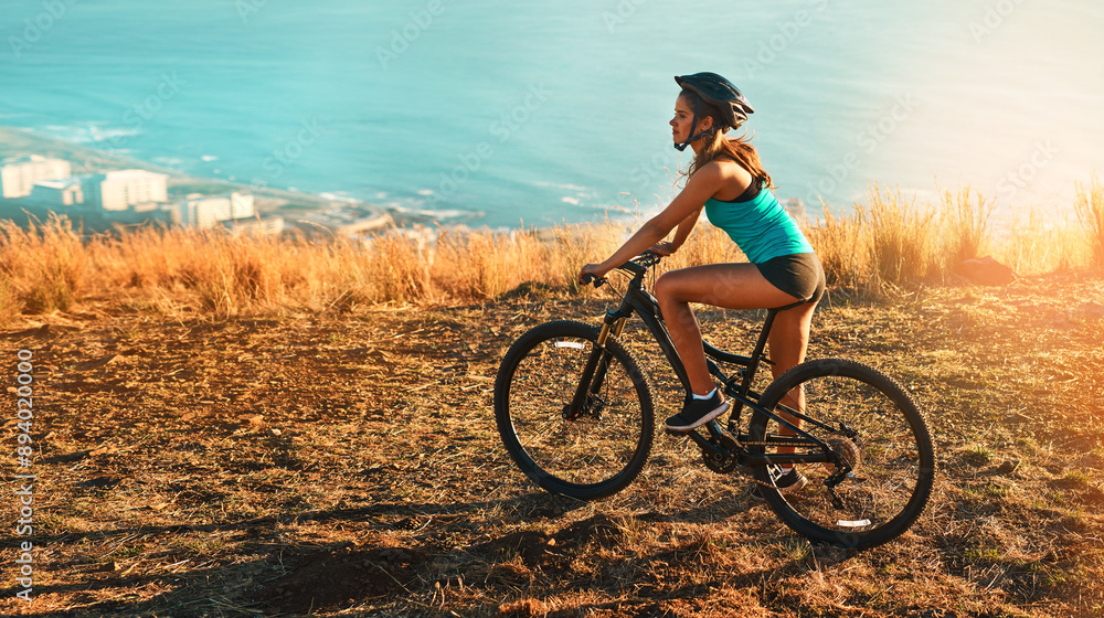 Mountain bike, fitness and woman with training, wellness and endurance with challenge, nature and cardio. Cycling, girl and athlete with practice for competition, healthy and exercise with balance Mountain bike, fitness and woman with training, wellness and endurance with challenge, nature and cardio. Cycling, girl and athlete with practice for competition, healthy and exercise with balance