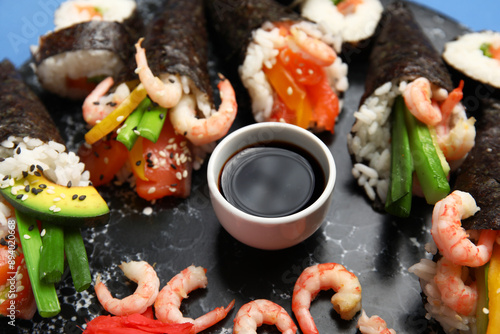 Board with tasty sushi cone...