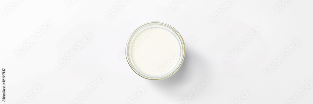 Glass of fresh milk on a white background, close-up view Glass of fresh milk on a white background, close-up view