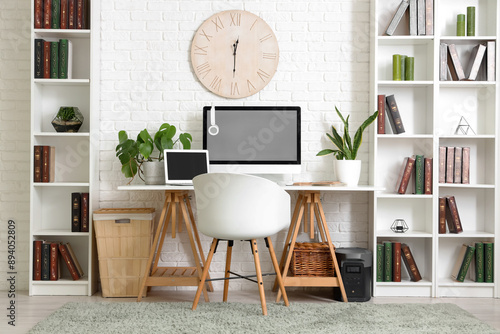 Stylish office with workpla...