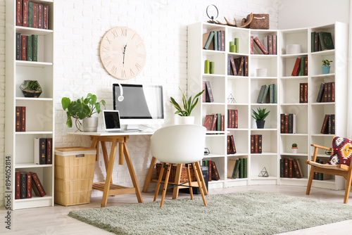 Stylish office with workpla...