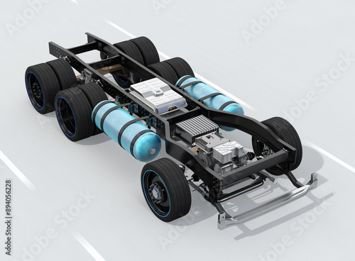 FCV Semi truck chassis moving on the road. Fuel cell hydrogen system equipped with fuel cell stack, battery, H2 gas tanks, dual motors. 3D rendering image.