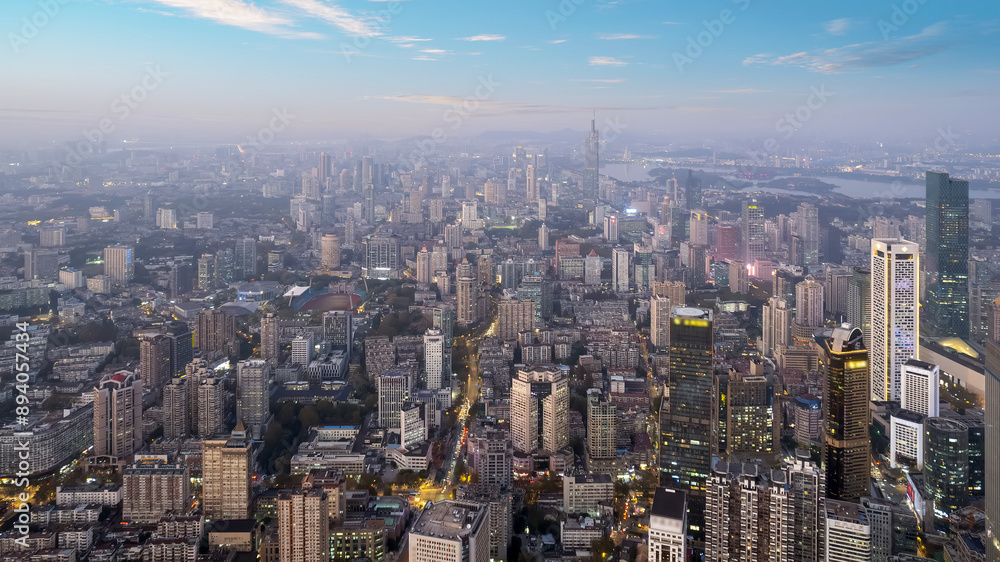 Fototapeta premium Aerial View of a Lively Urban Cityscape at Dusk