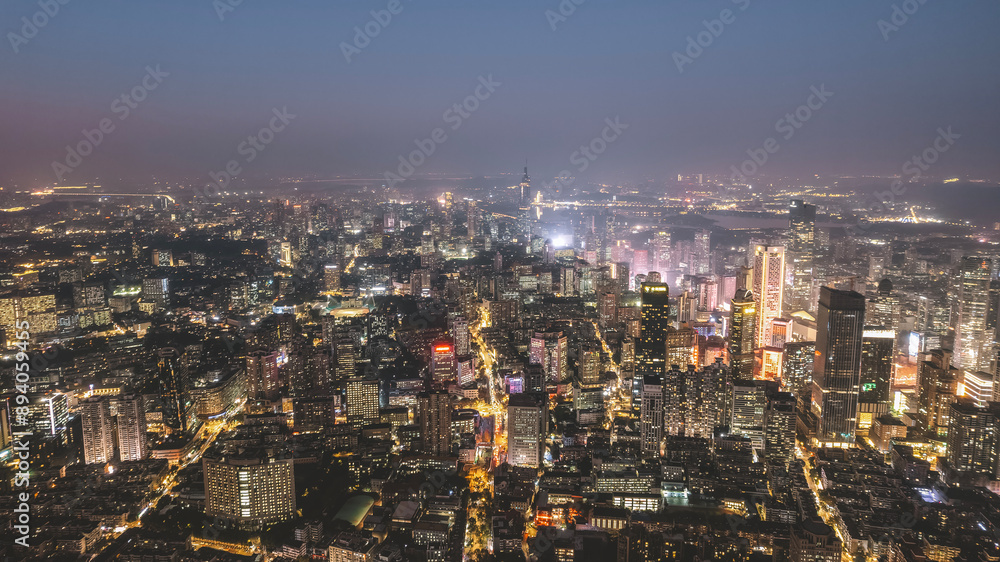 Vibrant Aerial Night View of a Bustling Global City Vibrant Aerial Night View of a Bustling Global City