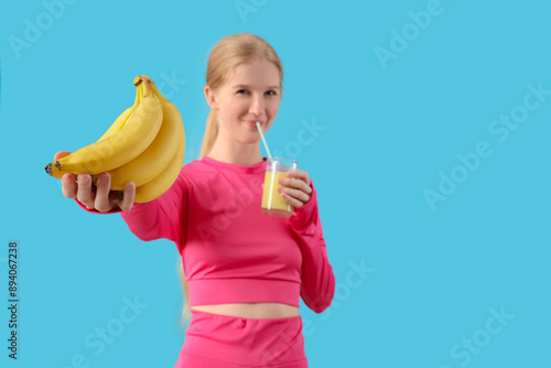 Sporty young woman with ban...