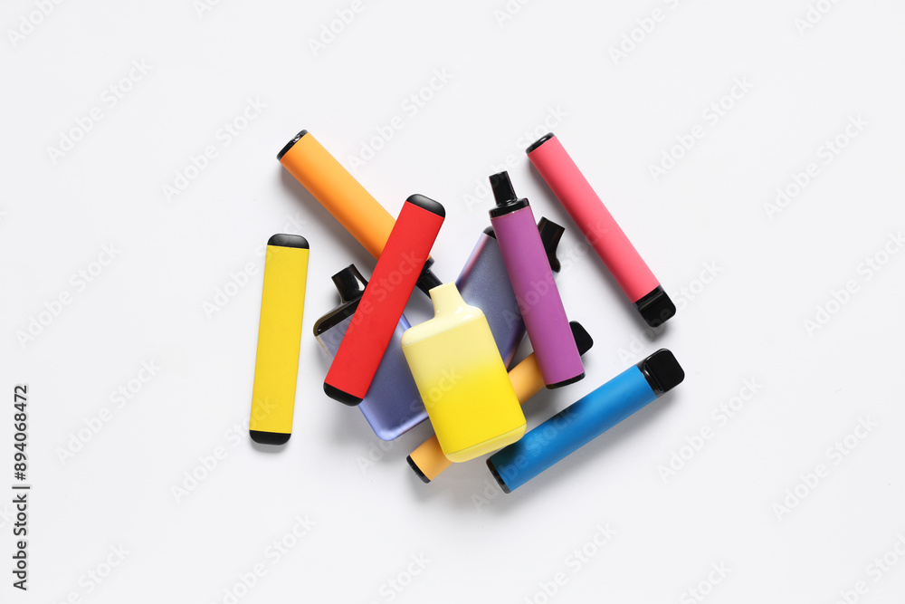 Different electronic cigarettes on white background Different electronic cigarettes on white background