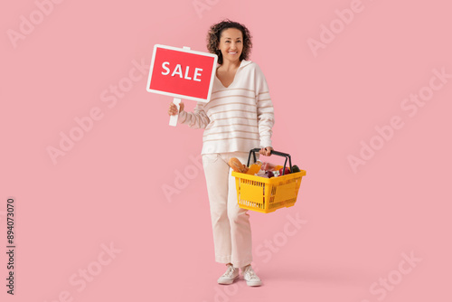 Mature woman with full shop...