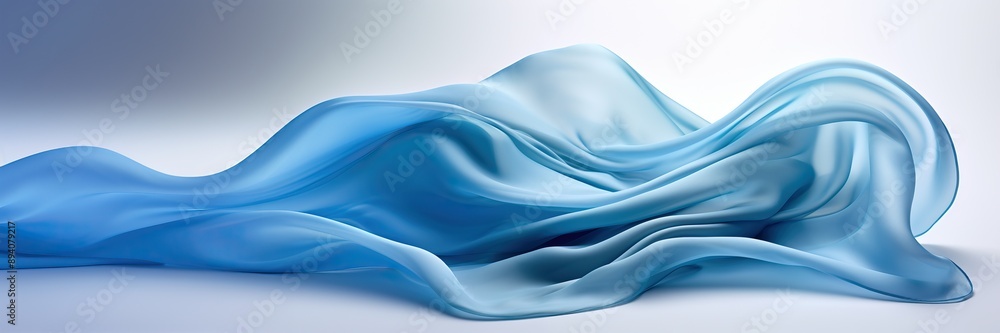 Blue wavy silk or satin isolated on white background Blue wavy silk or satin isolated on white background