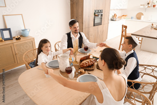 Jewish family celebrating s...