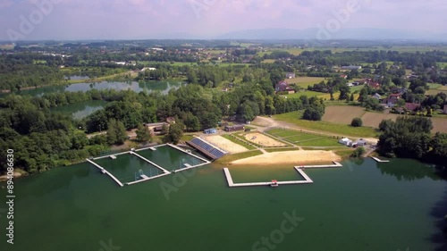 Zwirownia - Natural Swimming Pool On Reservoir In Kaniow, Poland. aerial, pull-back shot photo