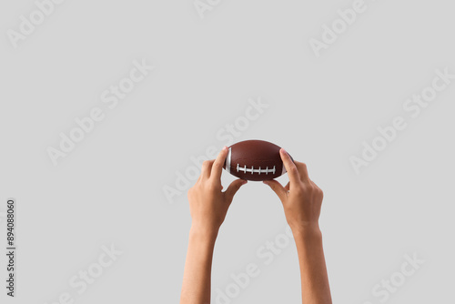Child with small rugby ball...