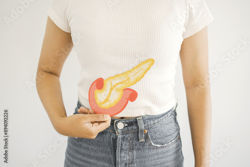 Woman hands holding pancreas, pancreatitis and pancreatic cancer concept photo