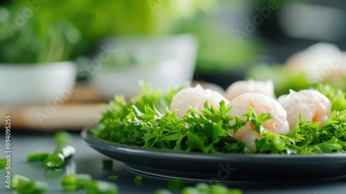 A close-up of a har gow dumpling, its translucent skin revealing the shrimp filling. photo