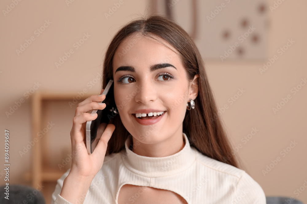 Young woman with diastema talking by mobile phone at home, closeup Young woman with diastema talking by mobile phone at home, closeup