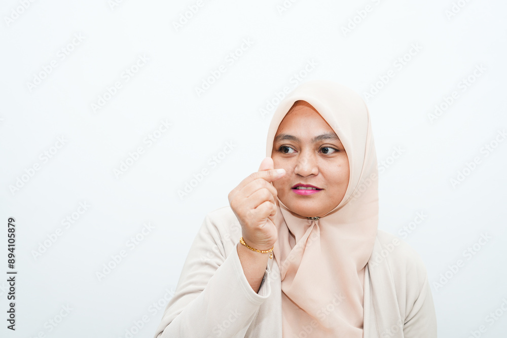 A beautiful woman is giving instructions and symbols with her fingers A beautiful woman is giving instructions and symbols with her fingers