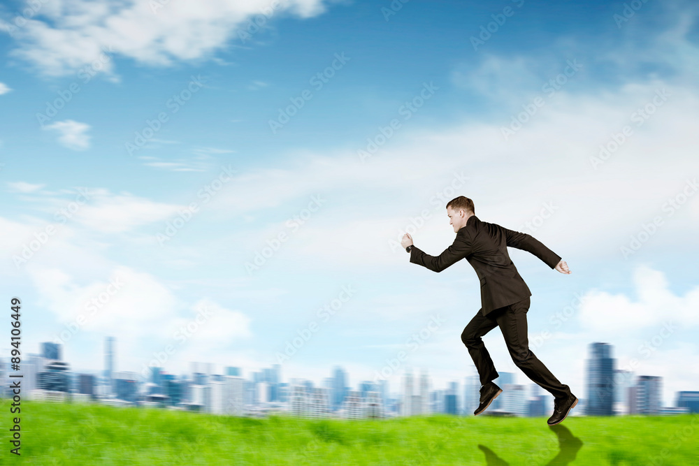 smiley businessman in suit running fast at outdoor smiley businessman in suit running fast at outdoor