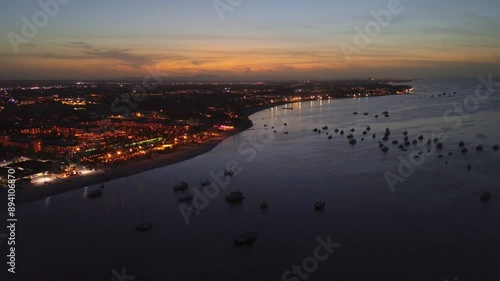 Wallpaper Mural Aerial view of Punta Cana, Dominican Republic, captured at dusk. The vibrant lights of the coastal town illuminate the shoreline, while the serene ocean reflects the hues of the setting sun. Torontodigital.ca