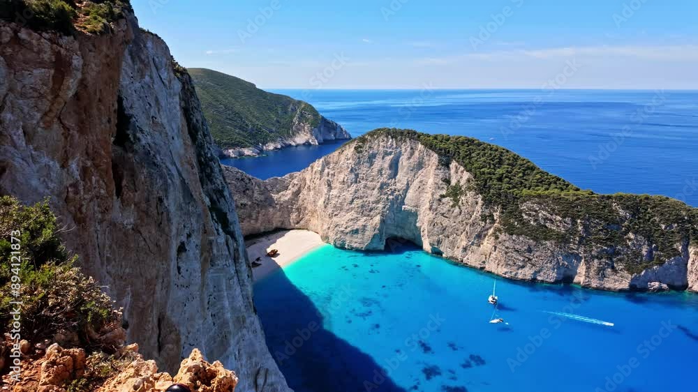 Boats and yachts at Navagio beach Shipwreck in Smugglers Cove bay with headland in Greece Zakynthos Blue Caves travel holidays Mediterranean Sea Boats and yachts at Navagio beach Shipwreck in Smugglers Cove bay with headland in Greece Zakynthos Blue Caves travel holidays Mediterranean Sea