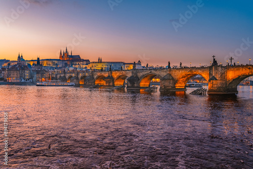 Obraz na plátně View of the city of Prague castle in hradcany and the Vltava river with Charles bridge in Prague, Czech Republic