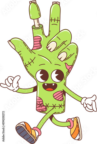 Cartoon retro groovy Halloween zombie hand character, vector funny monster. Halloween holiday horror night groovy funky dead zombie hand with vampire fangs for trick or treat party boo character