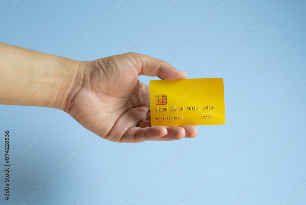Man holdin credit cards and he is choosing a credit card to pay and spend Payment for goods via credit card. Finance and banking concept Man holdin credit cards and he is choosing a credit card to pay and spend Payment for goods via credit card. Finance and banking concept