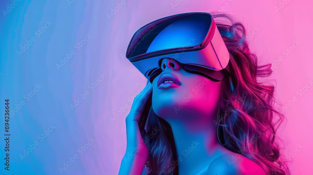 A woman experiencing virtual reality in a brightly lit studio A woman experiencing virtual reality in a brightly lit studio