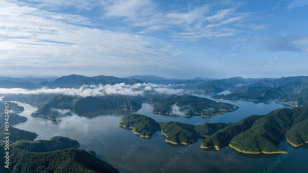 Aerial view of summer view of Yongdamho Lake with sea of clouds and on mountain at Wolgye-ri near Jinan-gun, South Korea
Aerial view of summer view of Yongdamho Lake with sea of clouds and on mountain at Wolgye-ri near Jinan-gun, South Korea