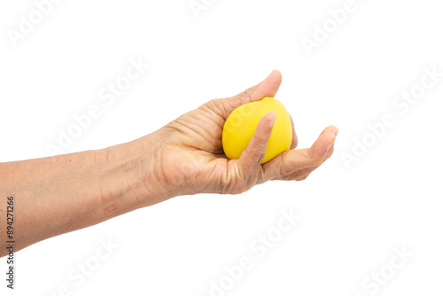 Female hand squeezing stress ball on white background