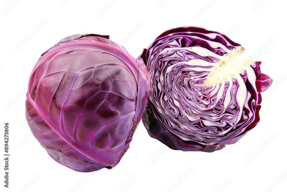 Whole red cabbage Cut it in half to reveal the purple layer. Isolated on a white background. Whole red cabbage Cut it in half to reveal the purple layer. Isolated on a white background.