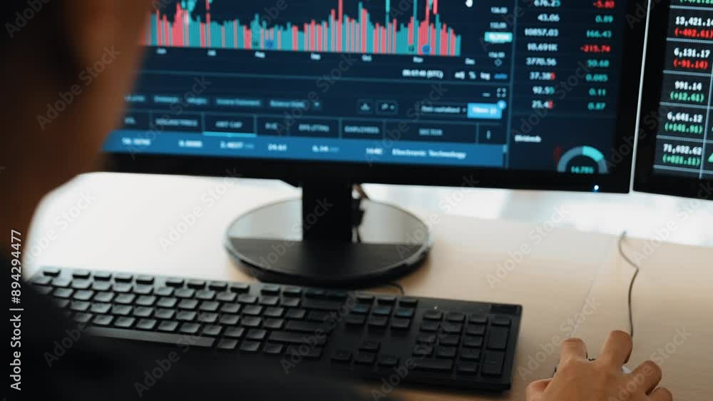 Slow motion business investor in stock trading company analyzing stock exchange marketing looking at monitors analyzing candle bar price for loss and grow up gain and profits. Burgeoning Slow motion business investor in stock trading company analyzing stock exchange marketing looking at monitors analyzing candle bar price for loss and grow up gain and profits. Burgeoning