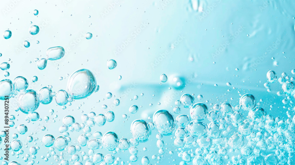 Oxygen bubbles in clear blue water, close-up. Mineral water. Water enriched with oxygen Oxygen bubbles in clear blue water, close-up. Mineral water. Water enriched with oxygen