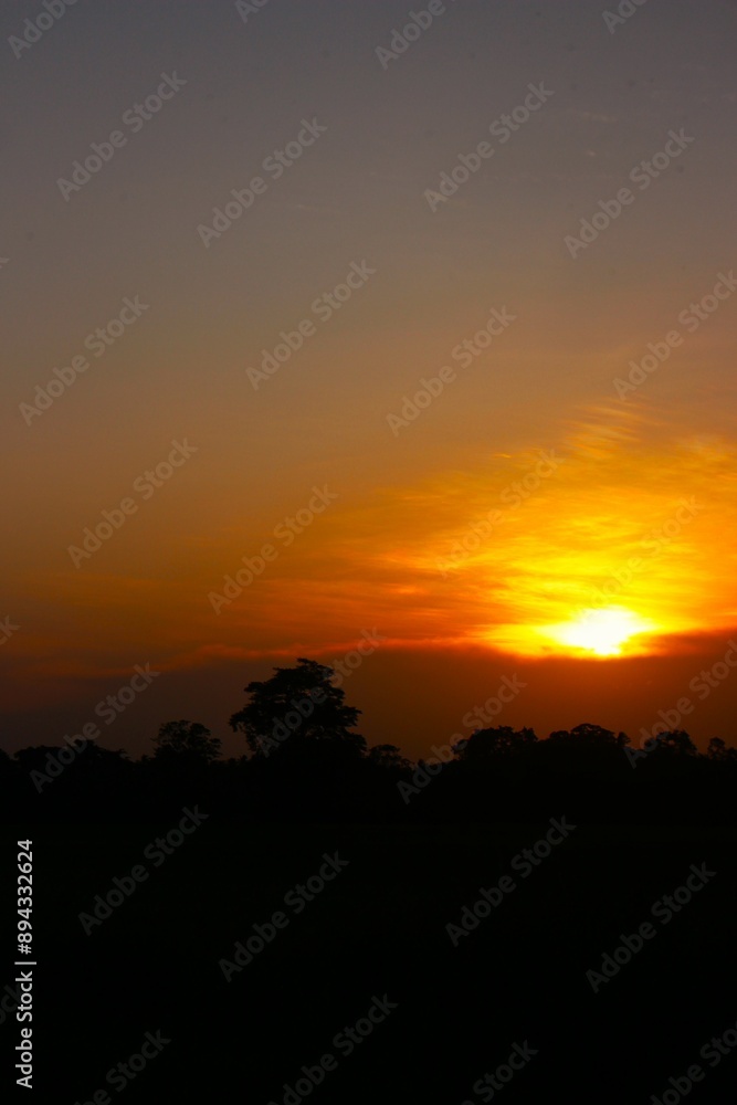 Sunset Sky Clouds in the evening with Red, Orange, Yellow and purple sunlight on Golden hour after sundown, Romantic sky in summer on Dusk Twilight. heart sky. Sunset Sky Clouds in the evening with Red, Orange, Yellow and purple sunlight on Golden hour after sundown, Romantic sky in summer on Dusk Twilight. heart sky.
