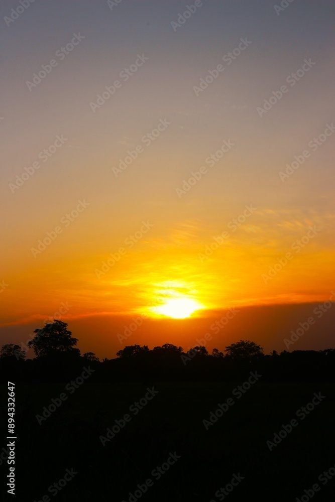 Sunset Sky Clouds in the evening with Red, Orange, Yellow and purple sunlight on Golden hour after sundown, Romantic sky in summer on Dusk Twilight. heart sky. Sunset Sky Clouds in the evening with Red, Orange, Yellow and purple sunlight on Golden hour after sundown, Romantic sky in summer on Dusk Twilight. heart sky.