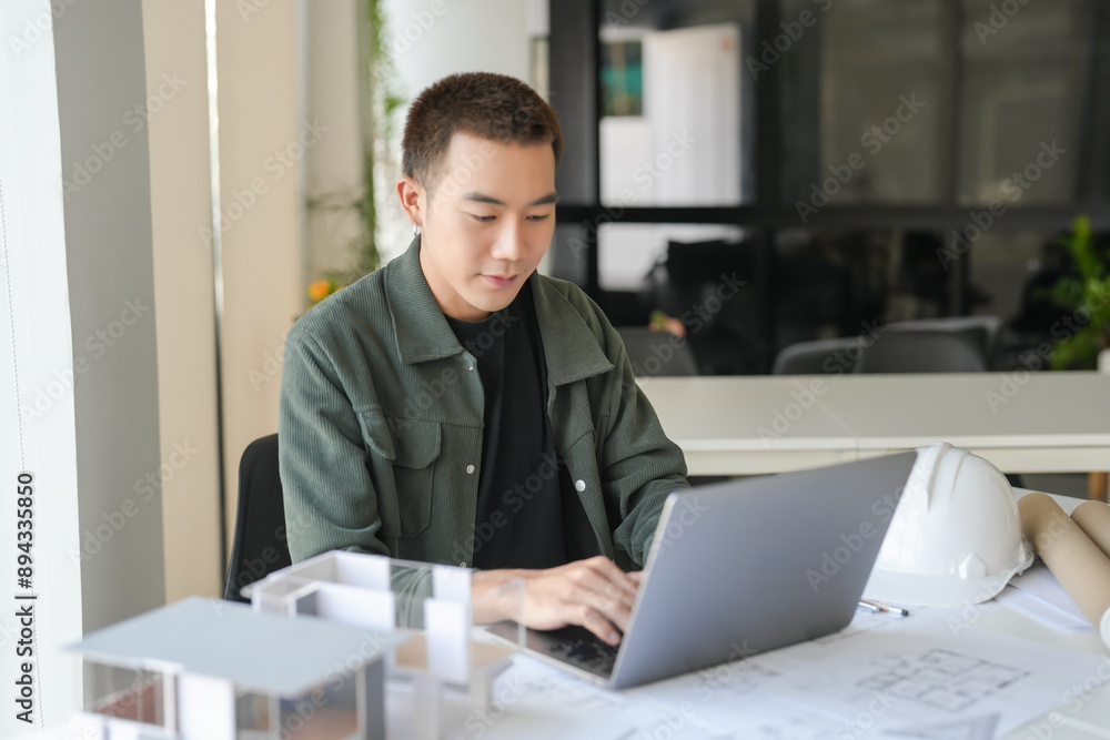 Architecture Man drawing on architectural Creative project business architecture building construction Industrial engineering Achievement Planning Design on laptop Architecture Man drawing on architectural Creative project business architecture building construction Industrial engineering Achievement Planning Design on laptop