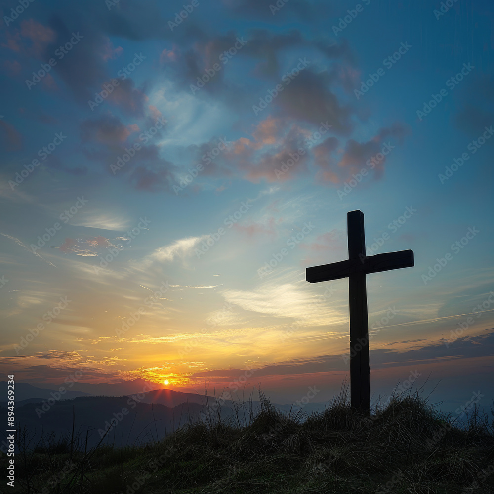 The cross stands tall on Calvary hill, its silhouette against the vibrant hues of sunrise and sunset. The empty space invites reflection on the Christian concept of Ascension Day. The cross stands tall on Calvary hill, its silhouette against the vibrant hues of sunrise and sunset. The empty space invites reflection on the Christian concept of Ascension Day.