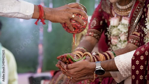A shot of an Indian Wedding where rituals are being performed
