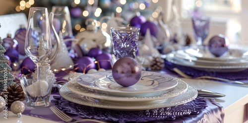 An elegant holiday table setting adorned with purple decorations creates a sophisticated and festive atmosphere.