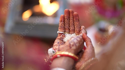 A shot of an Indian Wedding where rituals are being performed