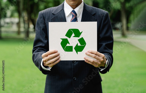 CSR corporate social responsibility. eco friendly design product. Save world ecology concept environmental conservation with hands holding cut out paper recycle showing