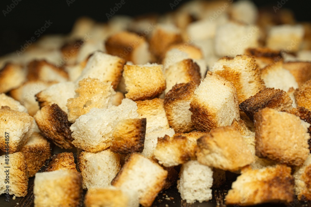 Croutons for making salad, close-up. Croutons for making salad, close-up.