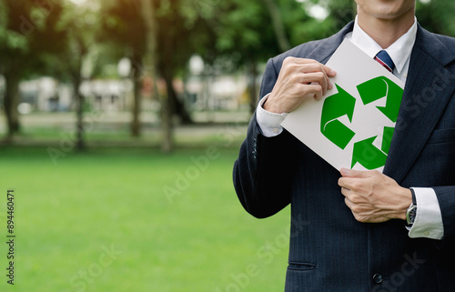 CSR corporate social responsibility. eco friendly design product. Save world ecology concept environmental conservation with hands holding cut out paper recycle showing