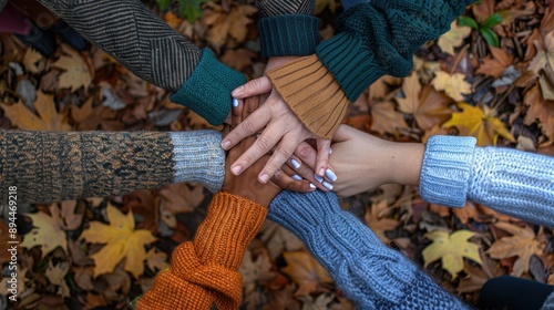 The hands in autumn unity photo