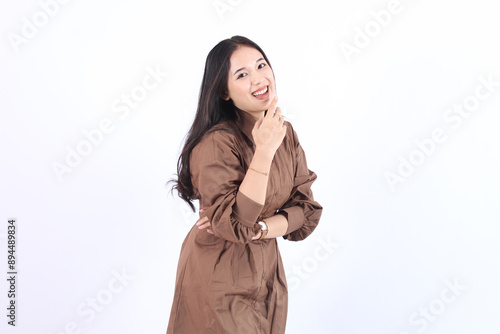 Happy young Asian woman joyful expression while standing position on white background