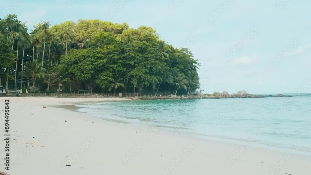 Freedom beach in Phuket island, Thailand with nobody. Tropical beach with crystal clear waters, sandy shore, palm trees and green foliage. Popular summer and winter vacation destination in Asia Freedom beach in Phuket island, Thailand with nobody. Tropical beach with crystal clear waters, sandy shore, palm trees and green foliage. Popular summer and winter vacation destination in Asia