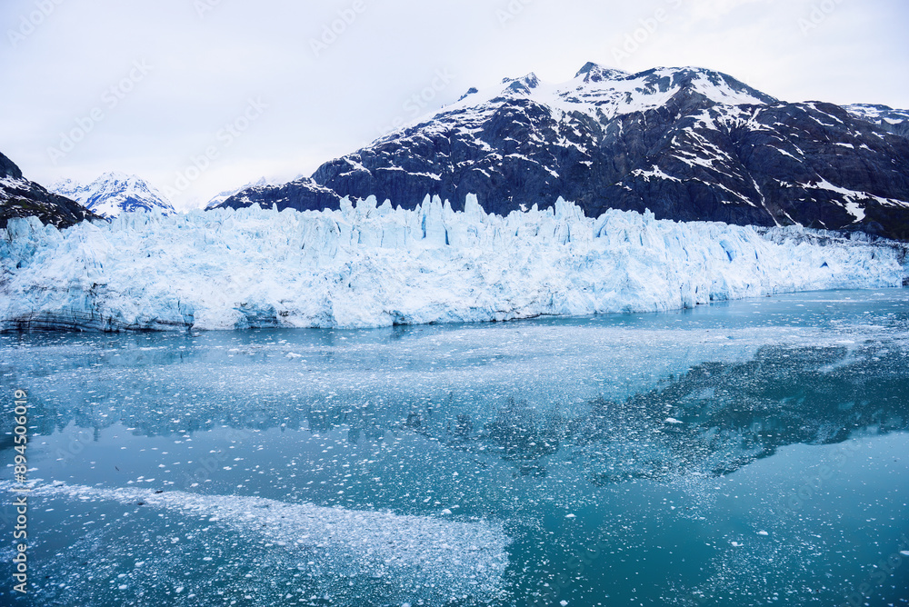 Fototapeta premium Glacier and mountains reflected in cold waters at Glacier Bay National Park and Preserve. Alaska.
