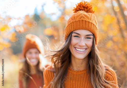 Woman Smiling in Orange Knit Hat During Fall
