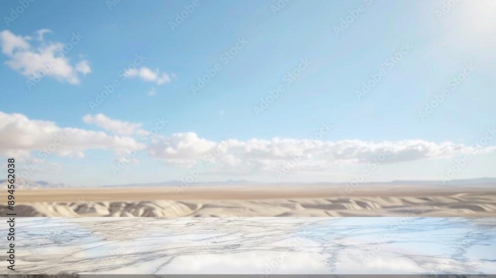 A white marble countertop sits in front of a desert landscape with a clear blue sky and white clouds. A white marble countertop sits in front of a desert landscape with a clear blue sky and white clouds.