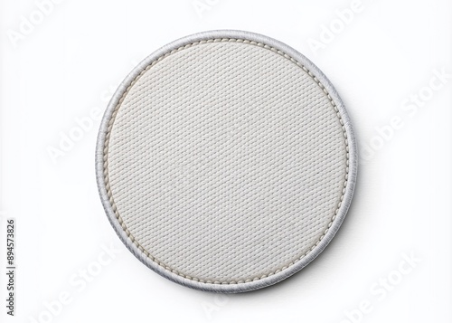 Obraz na płótnie Isolated rounded embroidered patch mockup with clear circular stitches on a blank white background, awaiting custom icon or logo design, ideal for branding and apparel. w salonie
